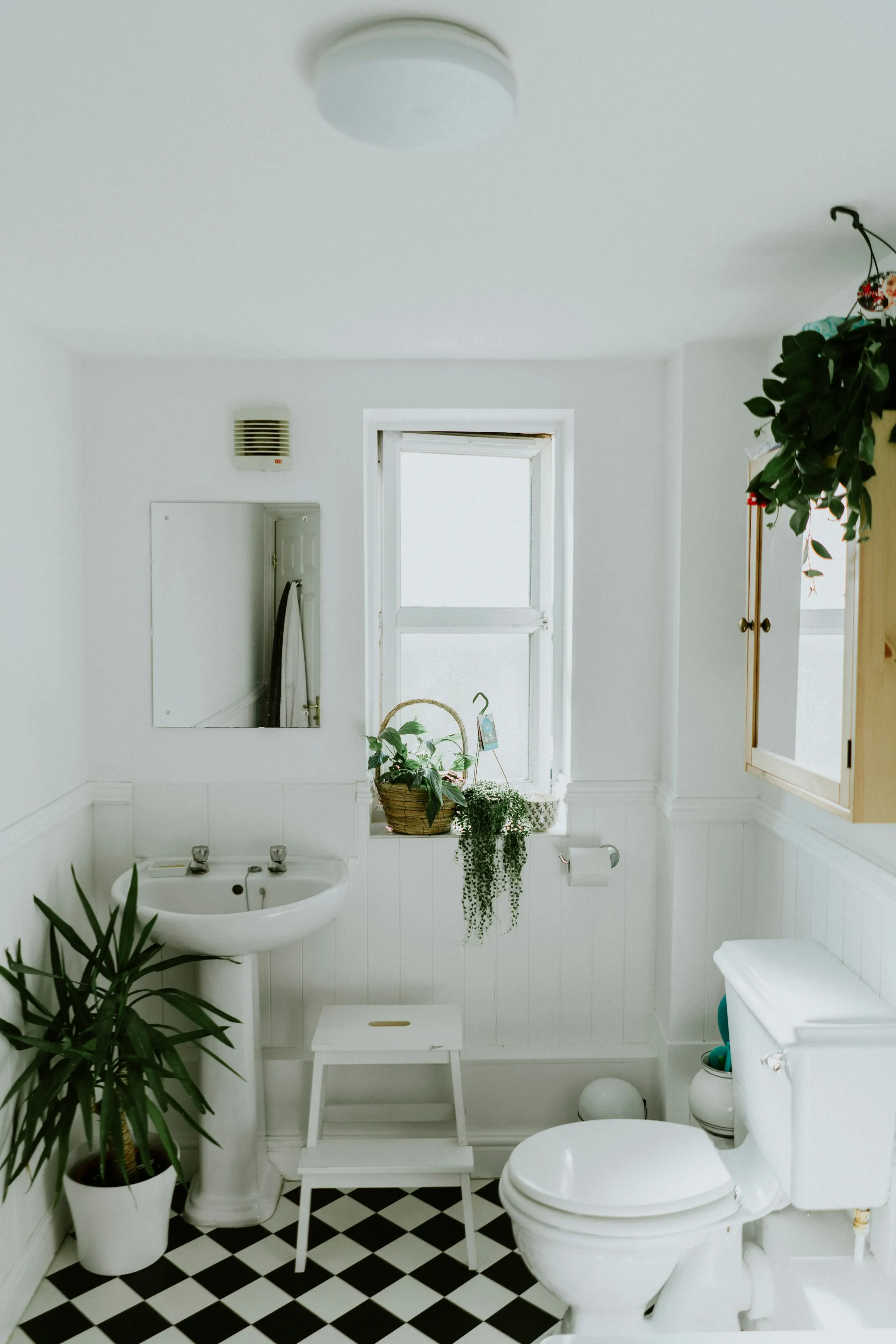 Spotless modern bathroom after a deep clean — gleaming tiles and fixtures